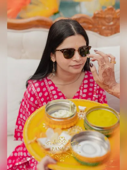 The bride-to-be receives her blessings during the Haldi ceremony.