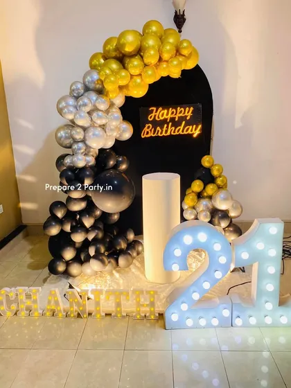 My 21st birthday decorations range from bold and modern to soft and elegant. I use marquee numbers, custom backdrops, and sophisticated balloon arrangements to mark this special occasion.