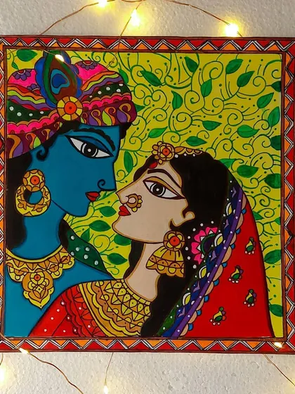I love the vibrant energy of Madhubani art. This painting of Radha and Krishna captures their divine love using the bold patterns and bright colors that are signatures of this beautiful folk art style from Bihar.