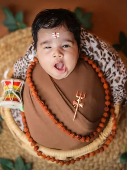 A tiny yawn from our little Shivansh, showing that even divine babies get sleepy.