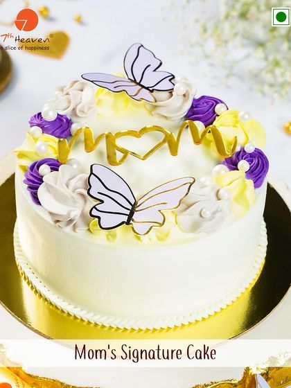 Our Mom's Signature Cake is a beautiful way to show your appreciation, decorated with delicate butterflies and a lovely "MOM" topper.