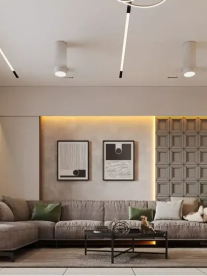 An L-shaped sectional sofa provides a comfortable and casual seating arrangement in this modern living room. The textured wall panel and abstract art add a layer of sophistication.