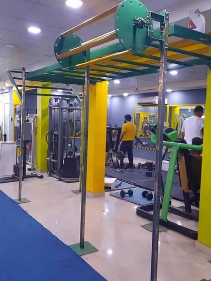 Another angle of the monkey bar rig, showing its length and sturdy construction. This is a core piece of our functional training area, used for a variety of bodyweight exercises.