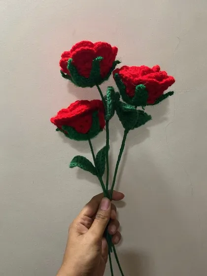 A handful of forever roses. These three deep red crochet roses are perfect on their own or as part of a larger bouquet.