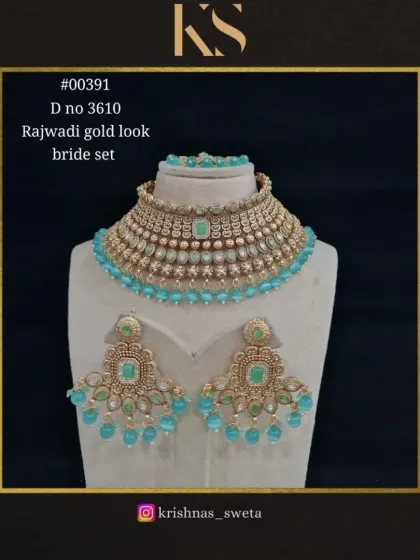 A stunning mint-blue version of the Rajwadi bridal set. This cool-toned option is perfect for a summer wedding or a bride looking for something unique and refreshing.