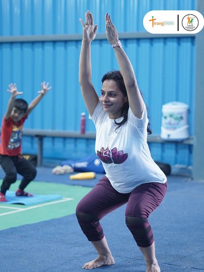 An instructor guiding participants during our International Yoga Day celebrations. These events are open to our entire community.