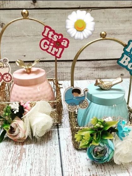 These are my simple yet elegant baby announcement gifts. Available in pink for a girl and blue for a boy, each basket holds a beautiful ceramic jar, making for a charming and thoughtful gesture from the company.
