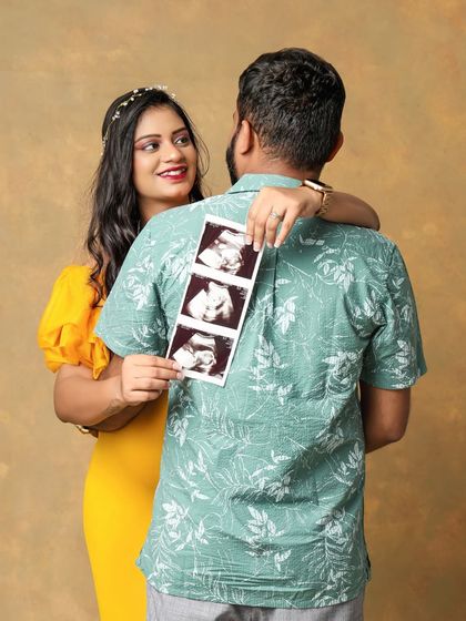 The first peek at their little one. Sharing the ultrasound pictures during a maternity shoot is a wonderful way to include the baby in the story from the very start.