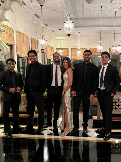 Looking sharp and ready for a show at a luxury hotel. We always coordinate our outfits to match the elegance and style of your wedding event.