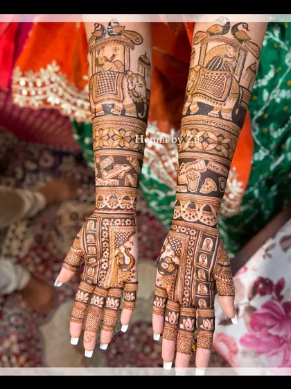 A classic bridal design telling the story of a wedding procession, with the baraat, elephants, and doli beautifully illustrated up the arms.