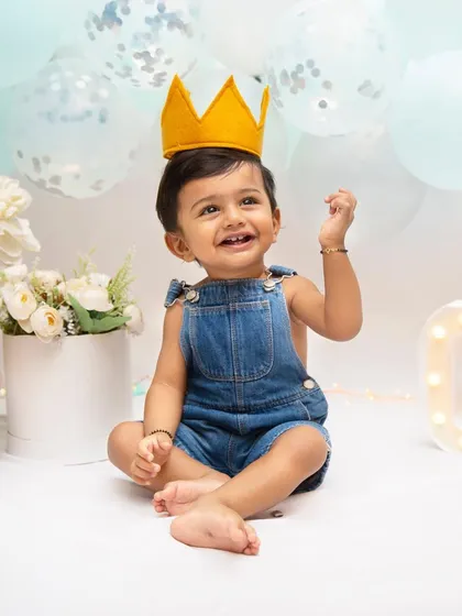 A first birthday is such a huge milestone. I love creating these bright, joyful setups to celebrate one whole year of your baby's personality, capturing their happy spirit as they officially become a toddler.