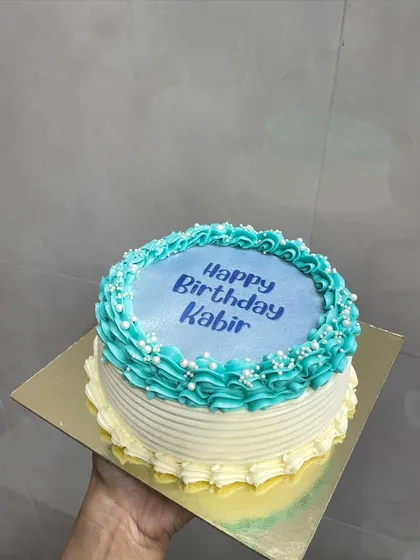 A custom birthday burn away cake is a fantastic way to celebrate. This one features a simple "Happy Birthday" message that gives way to a fun photo surprise.