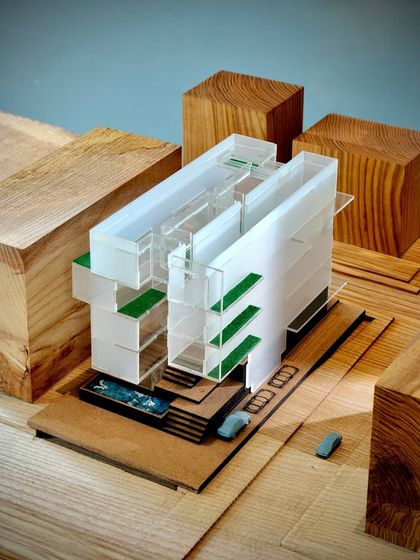 A conceptual physical model for a residence in New Delhi. This early model helps establish the building's massing and its relationship to the site, creating a visual dialogue between the structure and its urban environment.