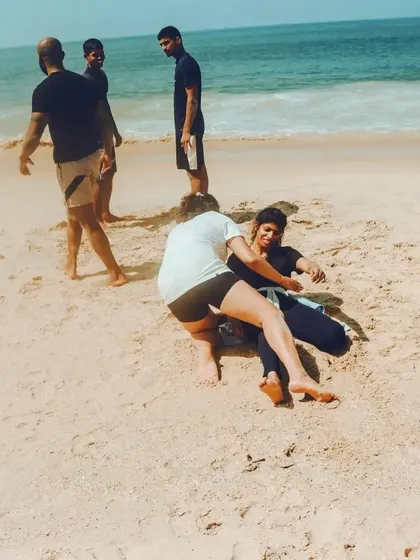 Jiu-Jitsu on the beach is a different beast. Here, two of our members are rolling on the sand, learning to adapt their grappling techniques to an unpredictable surface. This kind of training builds real, functional strength and resilience that you can't find on the mats alone.