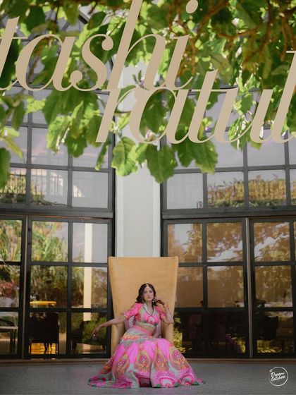 A stylish, editorial shot of the bride at Sula Vineyards. The composition and typography give this image a magazine-cover feel, perfect for a fashion-forward Haldi celebration.
