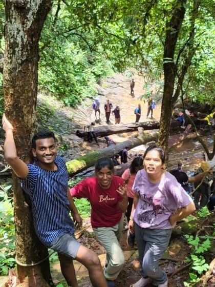 Having fun while crossing a stream during the Kodachadri trek.