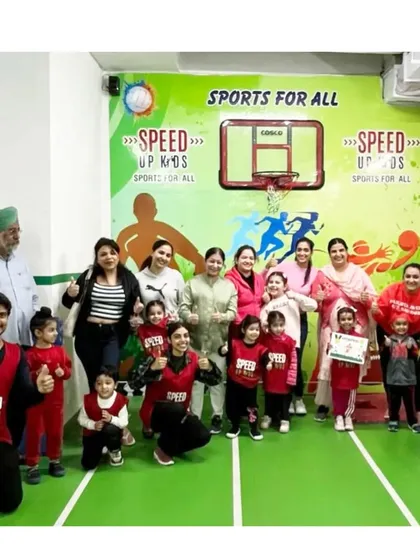 Kiara, another 'Most Valuable Kid' for February, with her family and the coaching team. Her dedication is an inspiration.