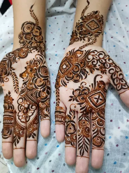A beautiful mix of floral patterns and cutwork diamonds, creating a unique and modern design.