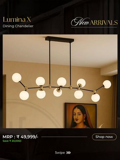 The Lumina X Dining Chandelier is modern art that provides ambient light. Its linear, branching design with multiple glowing orbs is a sophisticated choice for over a long dining table.