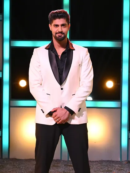 A full-length shot of Tanuj Virmani in our white tuxedo. We are proud to collaborate with stars who appreciate style and legacy.