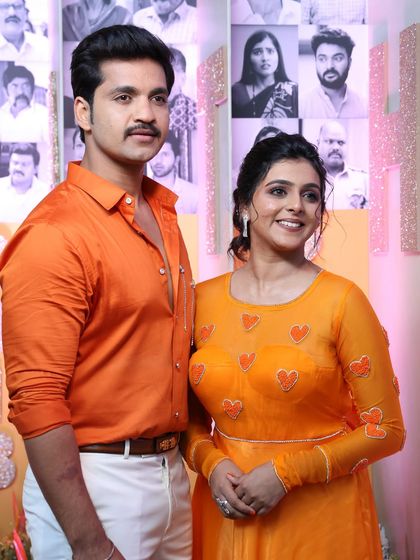 A classic couple portrait. Both actors look polished and ready for their red carpet event.