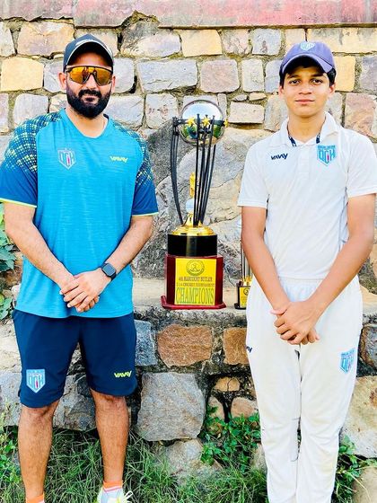 Another young champion with the trophy. We build winners from a young age.