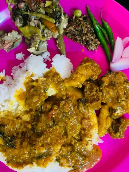 My lunch plate with the masala beef curry, rice, and a side of mixed vegetable stir fry and chutney.