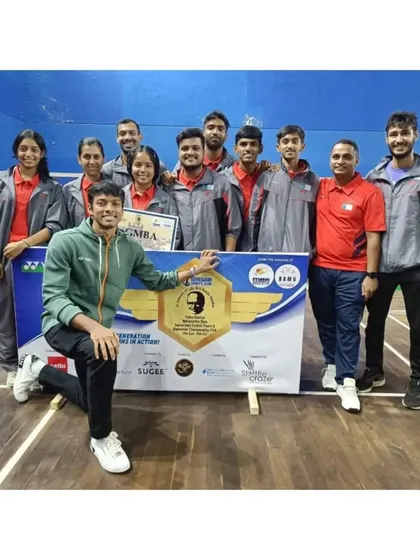 Success is a team effort. Here is our head coach, Mr. Siddhesh Raut, with the Greater Mumbai team celebrating their bronze medal win at the Senior Inter-District State Team Championship. We foster a supportive badminton family where everyone pushes each other to succeed.