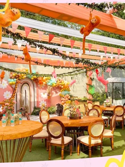 A view of the guest seating at our "Two Wild" jungle-themed party. We ensure every corner of the venue, including the dining area, is part of the magical theme.