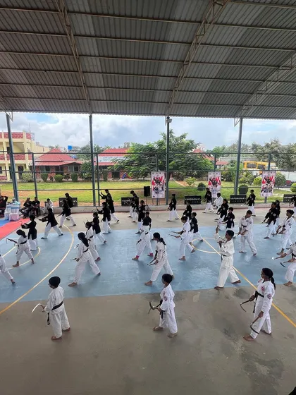 Our versatile covered court transforms to host a wide range of events, including this large-scale martial arts seminar, providing ample space and a professional setup for any discipline.