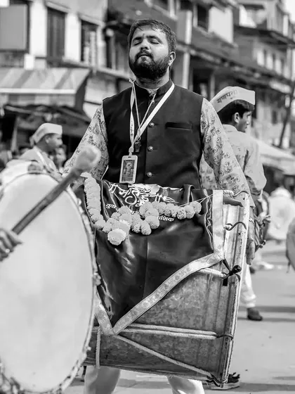 Another black and white shot of the dhol player, lost in the music.