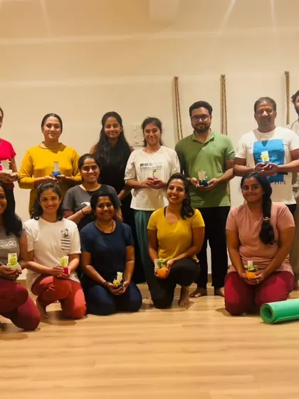 A group photo of our wonderful community. We grow together, support each other, and share the journey on and off the mat.