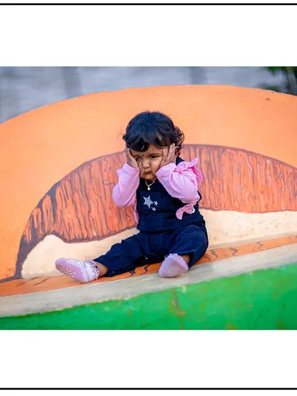 Another adorable expression from the same series. I take a variety of shots to ensure we capture a full range of your child's moods and faces.