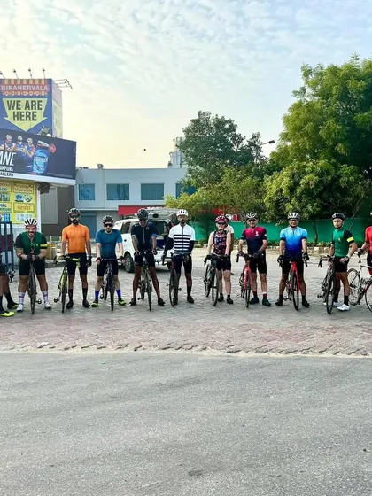 The group takes a break during the hot and humid 100km century ride. Hydration is key!
