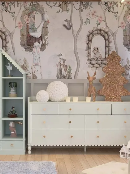 We believe storage should be part of the story. For this project in Gurgaon, we crafted a custom house-shaped bookshelf and a scalloped dresser to complement the fairytale wallpaper, turning a functional area into a whimsical play corner.
