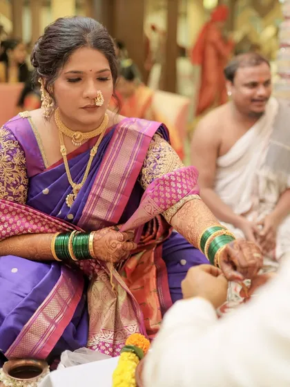 The bride participating in the wedding rituals. My draping ensures comfort without sacrificing the traditional aesthetic.