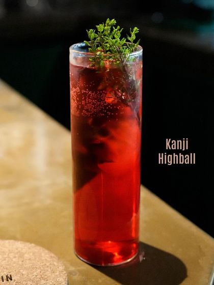 The Kanji Highball, a fermented, tangy, and deeply coloured drink from our India Bartender Week menu. It's a bold flavour for the adventurous palate.