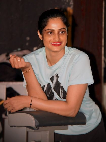 A confident smile after a good workout. The gym is my second home, a place where we build not just muscle, but also self-belief.