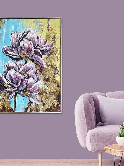 This hand-painted floral art features two large purple flowers against a textured blue and yellow background with gold leaf accents. It's a vibrant and beautiful piece that brings nature indoors.
