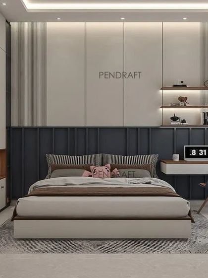 We designed this bedroom for two young boys using an indigo blue, grey, and white color theme. The layout includes a long bed with an integrated study desk.