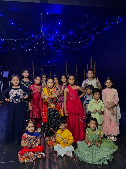 The full group of our young performers for the Navratri special event, ready to take the stage.
