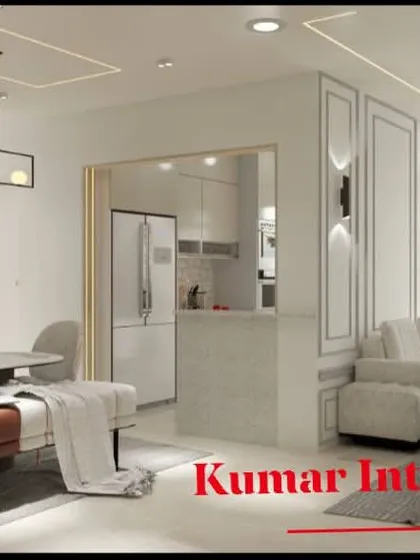 This angle shows the open-plan layout, with a clear view from the dining area into the kitchen. The consistent white theme unifies the different zones of the home.