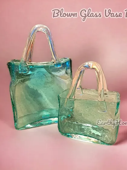The glass handbag vases are available in two sizes and make for an elegant and modern gift.