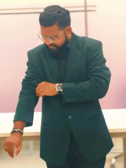 A candid moment, rolling up my sleeves. Be mischievous, not malicious. I am a gentleman, but not naive.