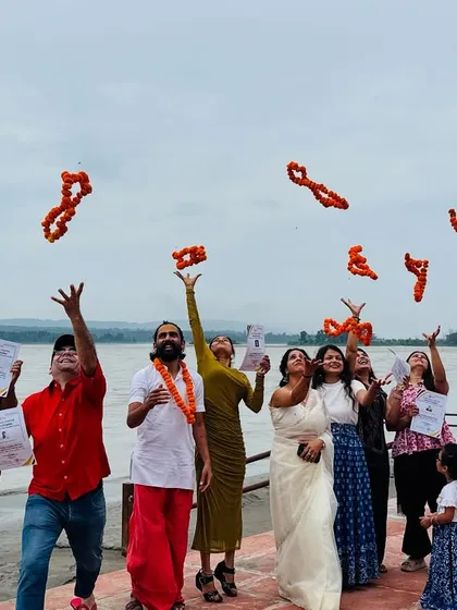 The journey of 200 or 300 hours culminates in this moment of joy and accomplishment. Here, our newly certified teachers celebrate their graduation by the Ganga in Rishikesh. This is more than a certificate; it is the beginning of a new path.