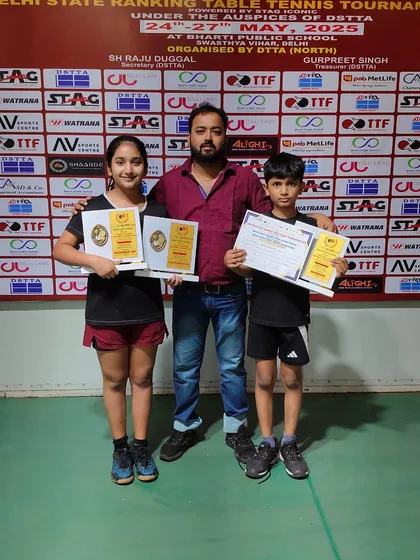 Champions together. Our coach stands proudly with Arunim Agarwal and Akanksha Singhal after their medal-winning performances at the 2nd Delhi State Ranking Tournament.