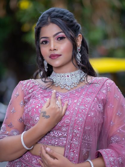 A confident portrait. The makeup is perfectly balanced to be noticeable but not overpowering.