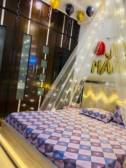 This image shows how the lit canopy can transform a room with dark wood furnishings, creating a warm and inviting space.