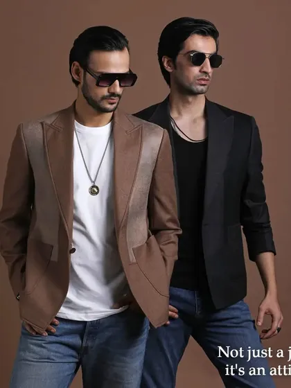 Two blazers, two attitudes. This image shows how a simple jacket can define a look, whether it's the earthy brown or the classic black.