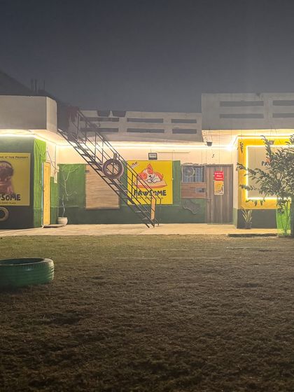 The front of our building at night. It's a welcoming and safe space for your pets to arrive at.